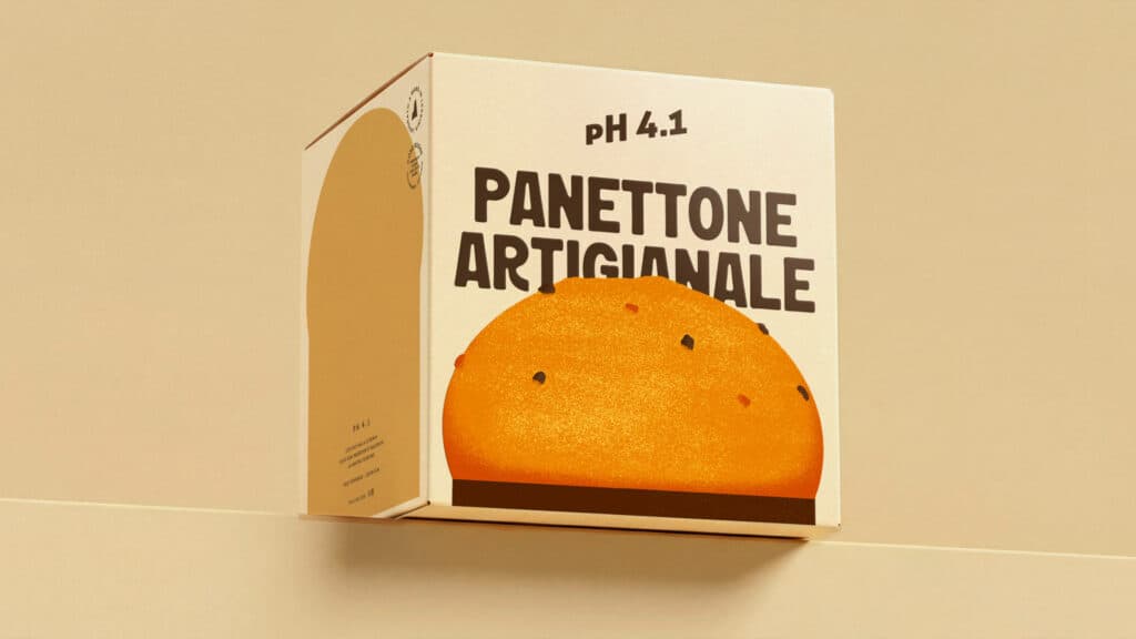 Boîte de panettone artisanal posée sur une surface plane