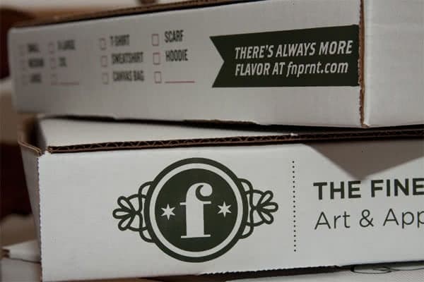 T-shirts in pizza boxes