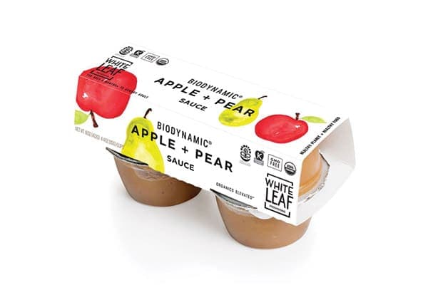 Cardboard sleeve with cutouts for fruit puree