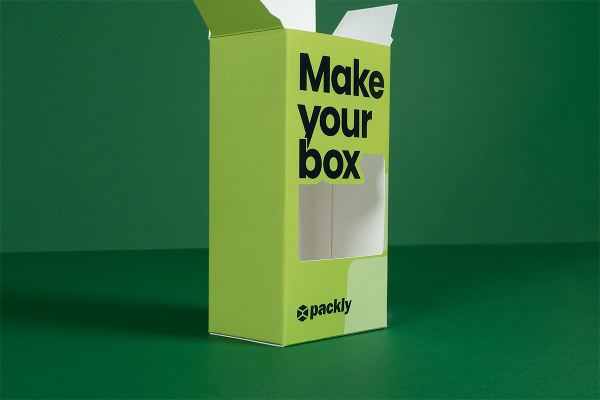 Green box with cut-out positioned vertically with focus on window